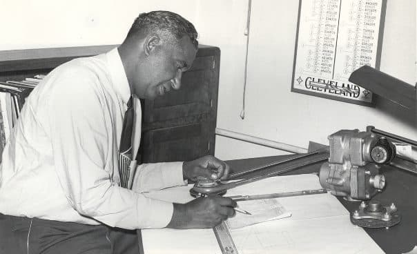 Frederick McKinley Jones at a drafting table