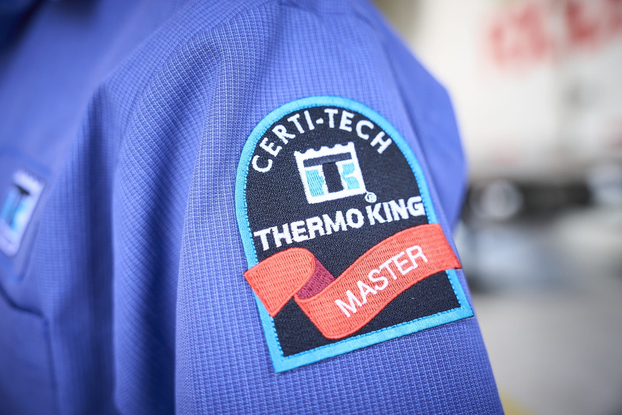 A Thermo King Certi-Tech Master patch on a technician's sleeve