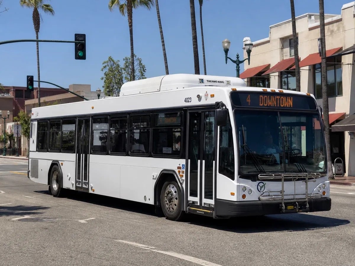 A transit bus with a Thermo King HVAC unit on its roof