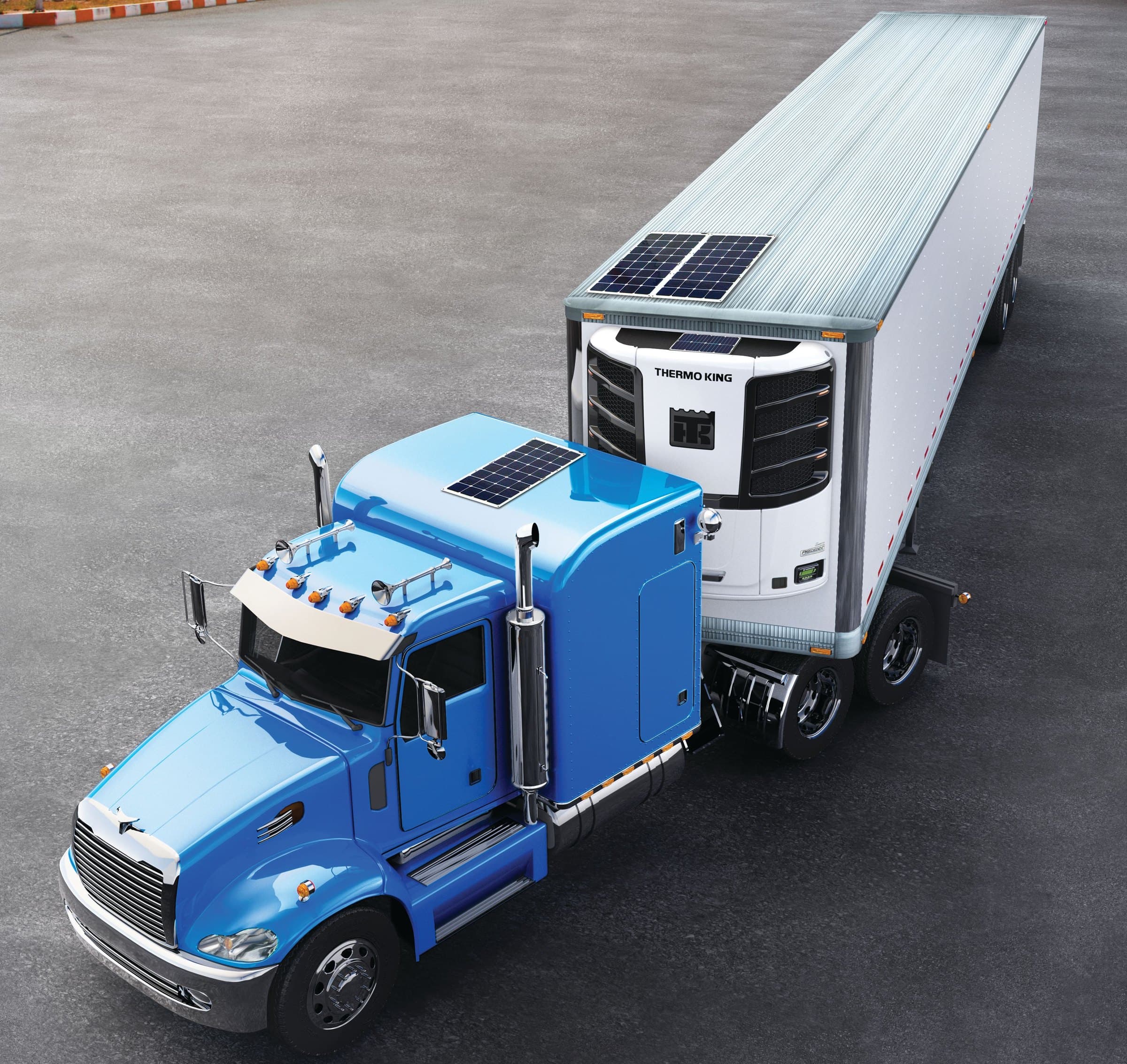 A blue tractor and its Thermo King reefer trailer, both with ThermoLite solar panels on the roof