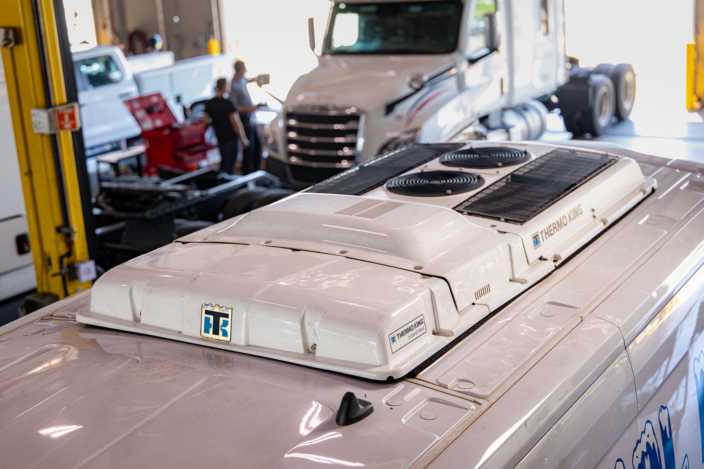 A Thermo King V-520 RT MAX rooftop unit on a van's roof