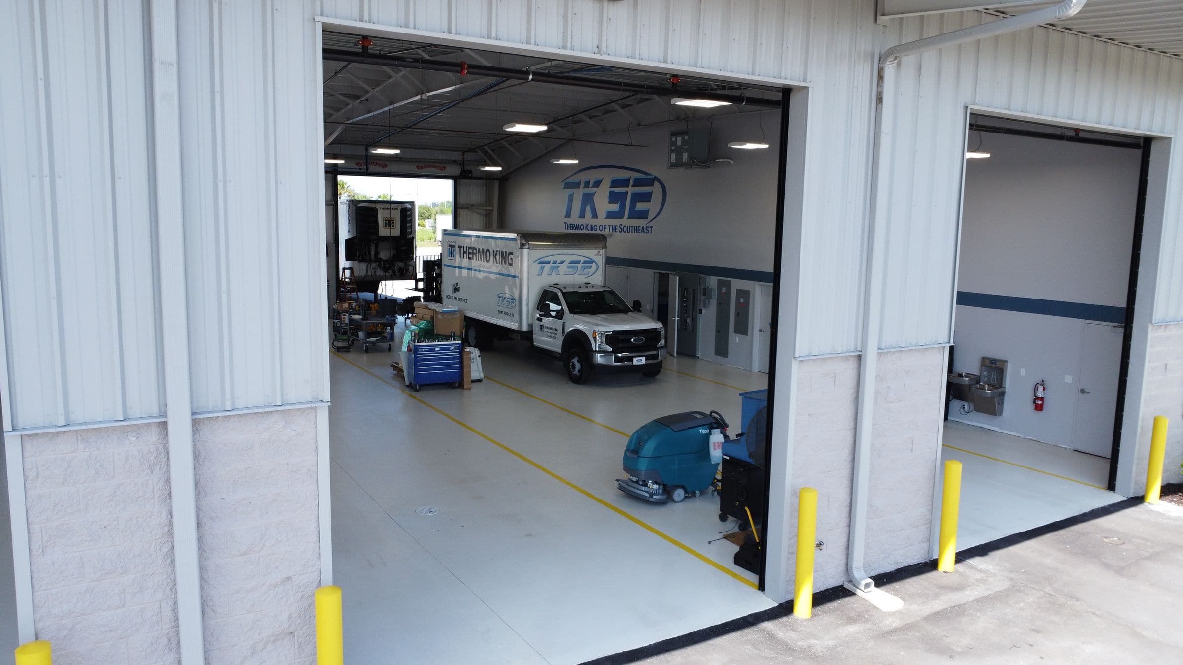 A TKSE service truck inside an open bay at the Fort Pierce shop
