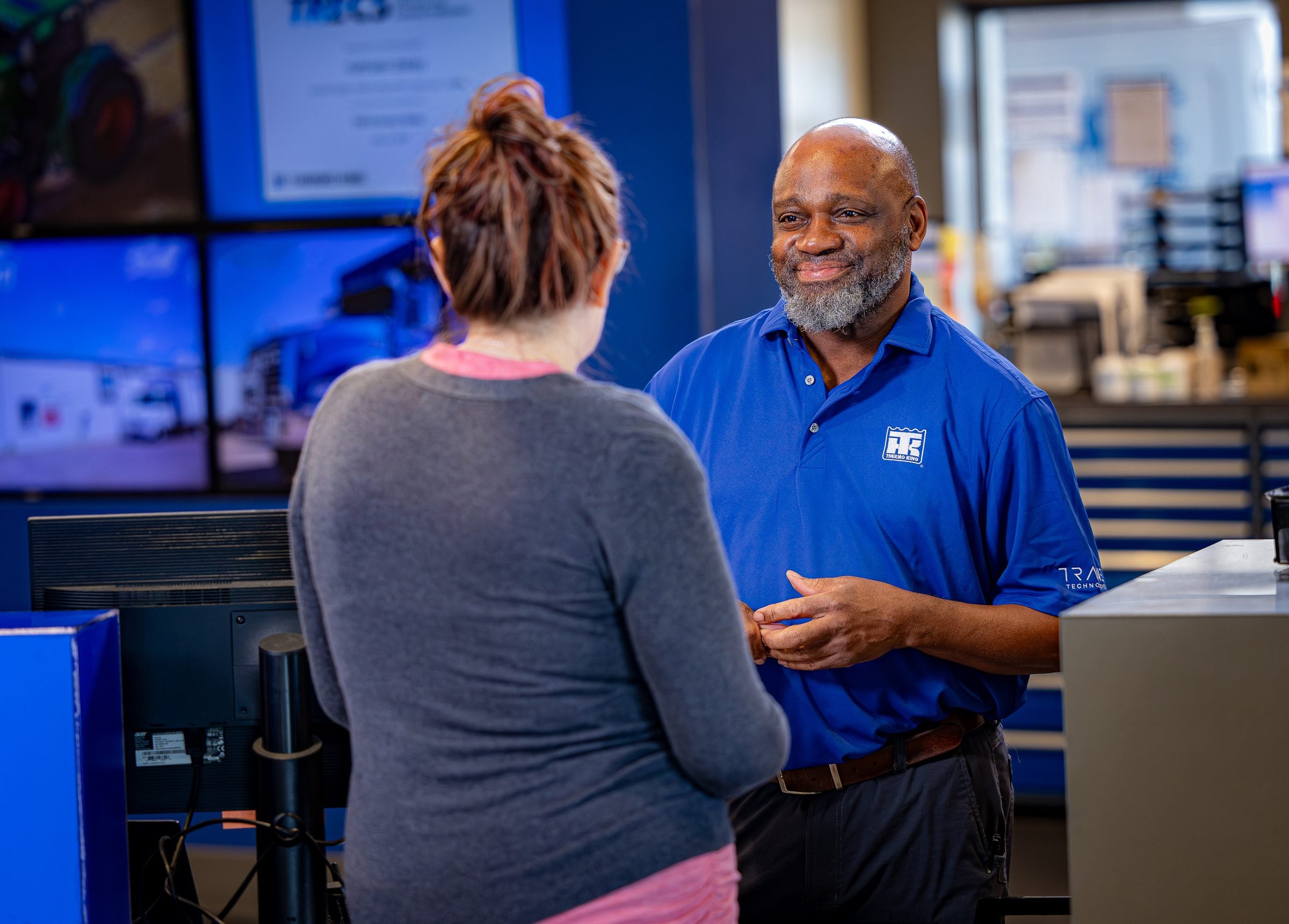 A customer at a Thermo King dealer's service desk