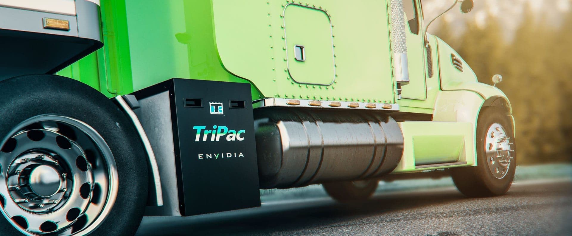 A Thermo King TriPac Envidia on the frame rail of a green tractor